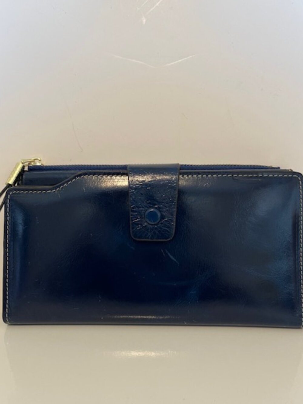 Navy leather wallet.